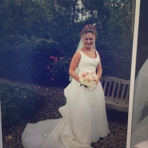 Wedding dress with detailed bodice and train